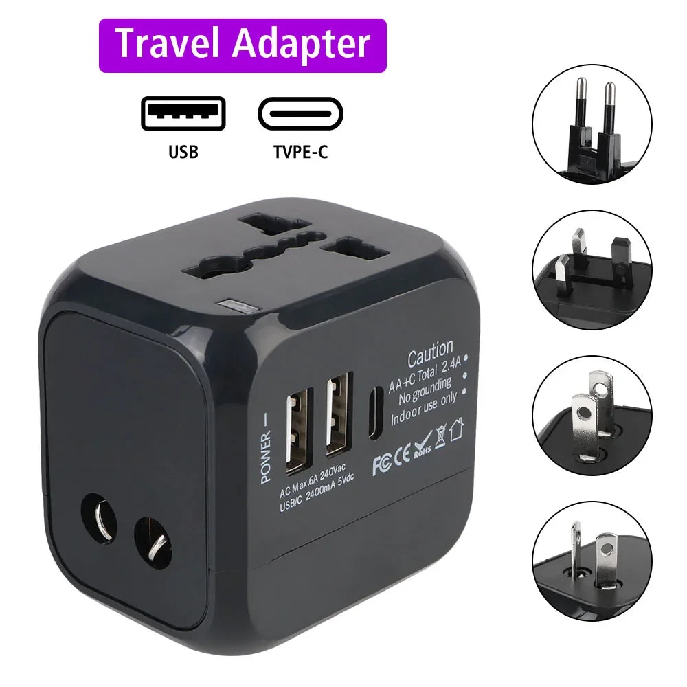 Black travel adapter with multiple plug sockets and USB ports on a white background